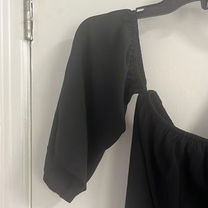 Cute black off the shoulder polyester top size XL nice weight new and never worn